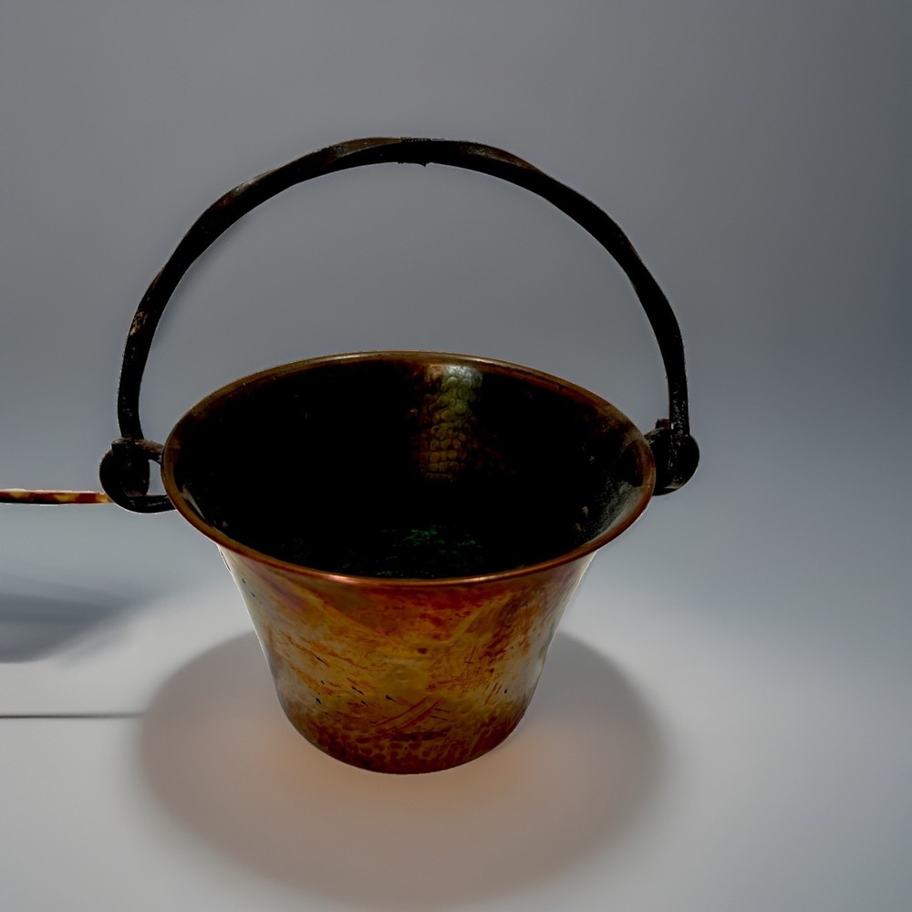 Hammered copper pot with a wrought iron handle, made by Stockli Netstal. VINTAGE